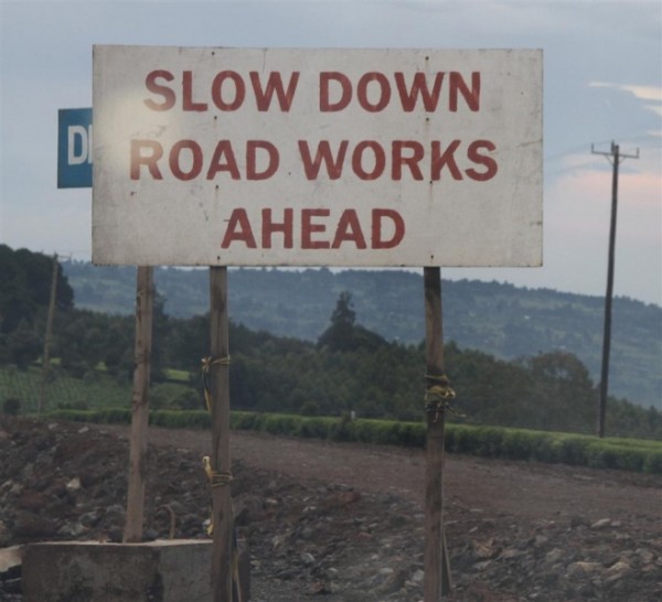 Go slow road sign
