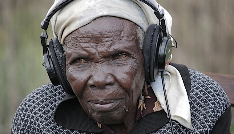 80-year-old-widow-of-one-of-the-musicians-listening-to-the-music-her-husband-recorded-in-the-1950s-760-x-435