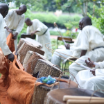 Musisi's work: drummers setting up to perform