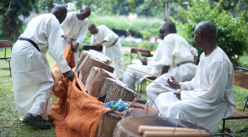 Musisi's work: drummers setting up to perform